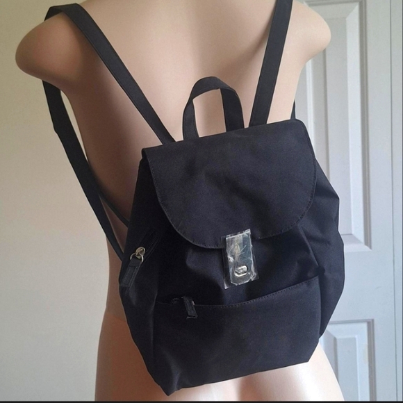 Mini black nylon backpack with a cynch closure and magnetic flap - Picture 1 of 8
